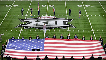 Dec 7, 2024; Arlington, TX, USA; A view of the Big 12 logo and American flag before the game between the Iowa State Cyclones and the Arizona State Sun Devils at AT&T Stadium. Mandatory Credit: Jerome Miron-Imagn Images