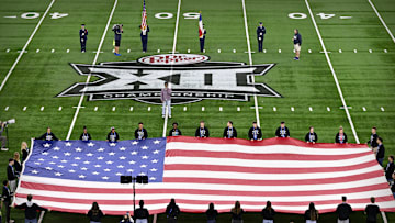 Dec 7, 2024; Arlington, TX, USA; A view of the Big 12 logo and American flag before the game between the Iowa State Cyclones and the Arizona State Sun Devils at AT&T Stadium. Mandatory Credit: Jerome Miron-Imagn Images