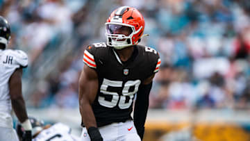 Sep 15, 2024; Jacksonville, Florida, USA; Cleveland Browns linebacker Jordan Hicks (58) celebrates a sack against the Jacksonville Jaguars in the third quarter at EverBank Stadium. Mandatory Credit: Jeremy Reper-Imagn Images