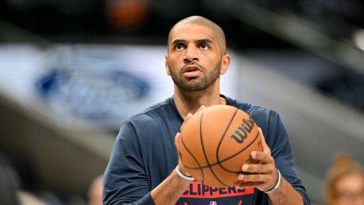 LA Clippers forward Nicolas Batum (33) warms up before the game against the Dallas Mavericks at the American Airlines Center on Mar 21, 2026.