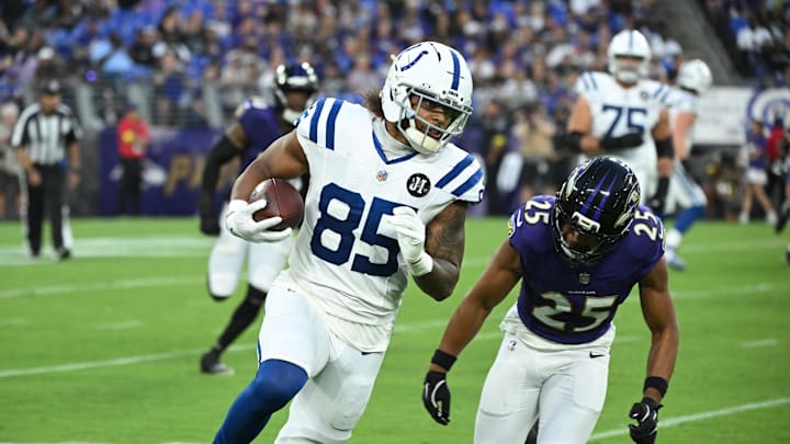 Aug 7, 2025; Baltimore, Maryland, USA; Indianapolis Colts tight end Drew Ogletree (85) runs with the ball after making a catch in front of Baltimore Ravens safety Beau Brade (25) during the second quarter at M&T Bank Stadium. Mandatory Credit: Rafael Suanes-Imagn Images
