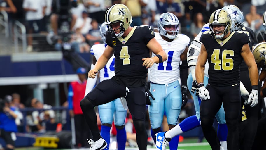 Carr celebrates after scoring a running touchdown against the Cowboys. He also passes for a couple scores in the win. | Kevin Jairaj-Imagn Images