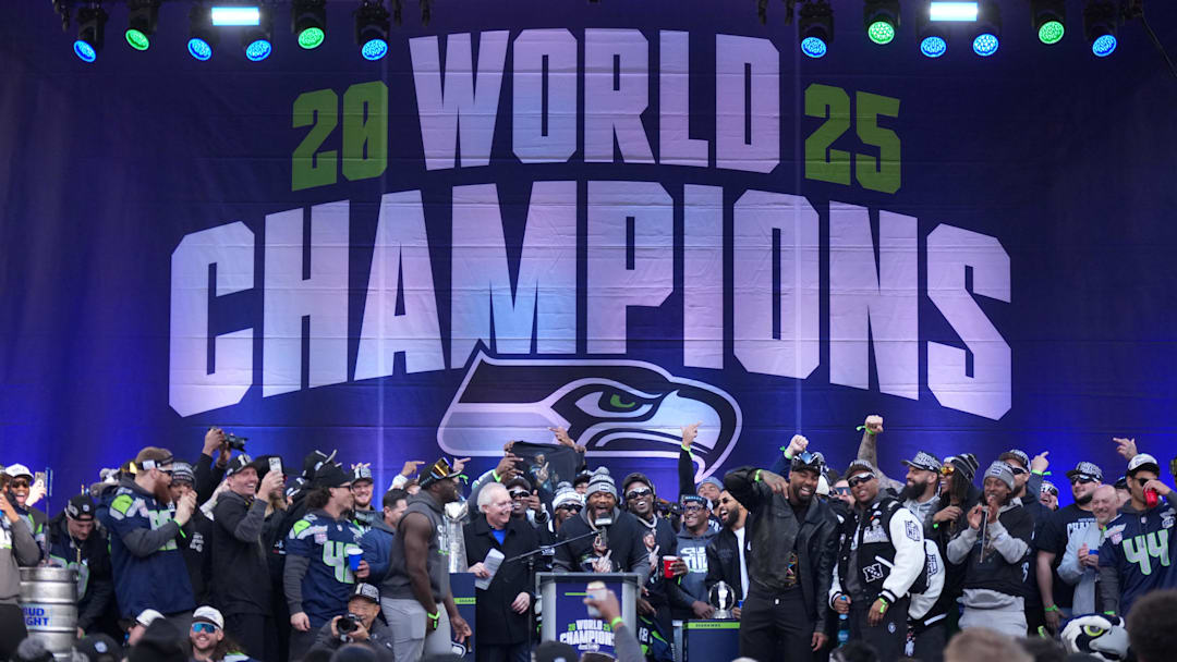 Feb 11, 2026; Seattle, WA, USA; Seattle Seahawks linebacker Ernest Jones IV (13) speaks during the Super Bowl LX trophy celebration at Lumen Field.