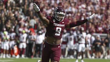 Nov 15, 2025; College Station, Texas, USA; Texas A&M Aggies defensive end Cashius Howell (9) reacts after a defensive play during the first quarter against the South Carolina Gamecocks at Kyle Field. Mandatory Credit: Troy Taormina-Imagn Images
