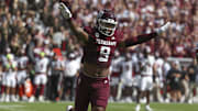 Nov 15, 2025; College Station, Texas, USA; Texas A&M Aggies defensive end Cashius Howell (9) reacts after a defensive play during the first quarter against the South Carolina Gamecocks at Kyle Field. Mandatory Credit: Troy Taormina-Imagn Images