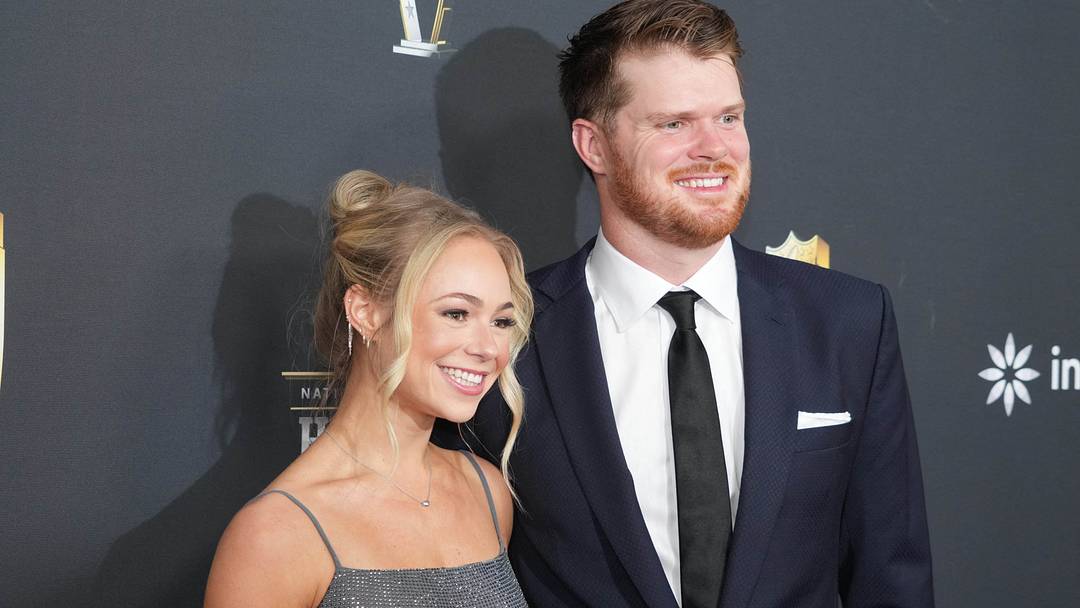 Seattle Seahawks quarterback Sam Darnold and Katie Hoofnagle on the red carpet before Super Bowl LIX NFL Honors at Saenger Theatre.