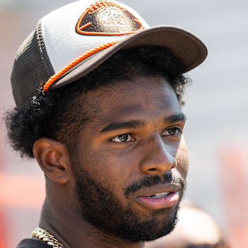 May 10, 2025; Berea, OH, USA; Cleveland Browns quarterback Shedeur Sanders (12) talks to the media during rookie minicamp at CrossCountry Mortgage Campus. Mandatory Credit: Ken Blaze-Imagn Images