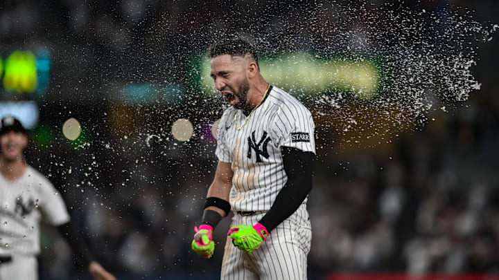Jose Caballero's walk-off hit clinched a postseason spot for the Yankees on Tuesday night.