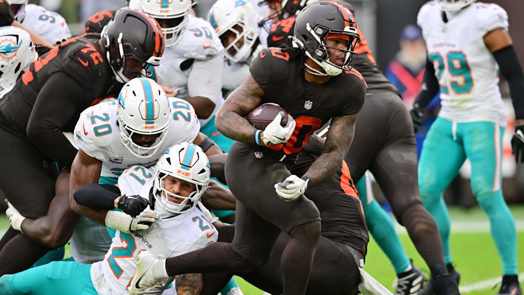 Oct 19, 2025; Cleveland, Ohio, USA; Cleveland Browns running back Quinshon Judkins (10) scores a touchdown during the second half against the Miami Dolphins at Huntington Bank Field. Mandatory Credit: Ken Blaze-Imagn Images