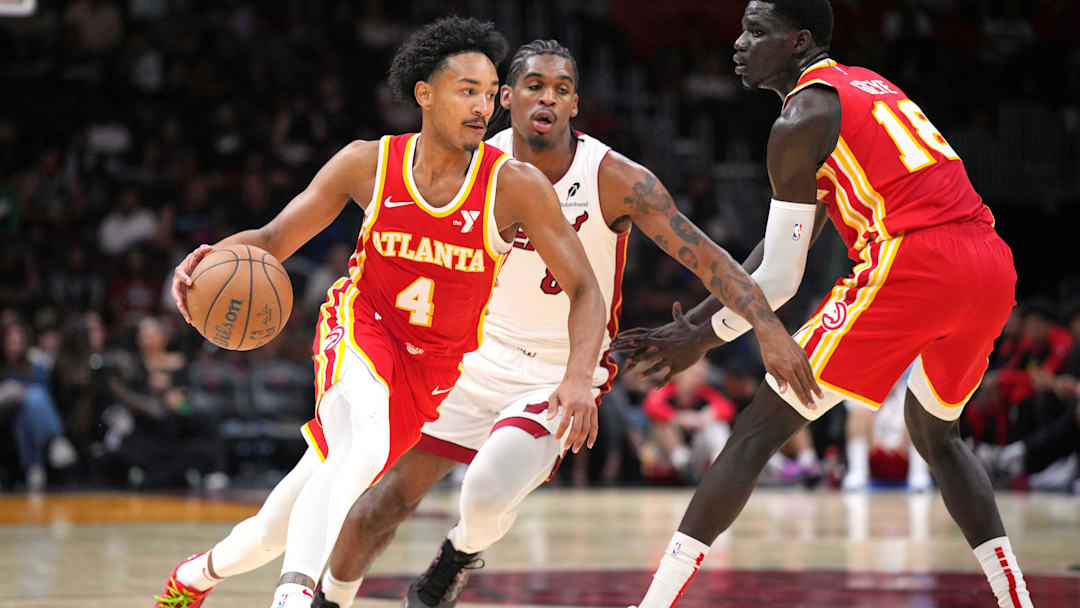 Oct 16, 2024; Miami, Florida, USA; Atlanta Hawks guard Kobe Bufkin (4) brings the ball up the court against the Miami Heat in the second half at Kaseya Center. Mandatory Credit: Jim Rassol-Imagn Images Oct 16, 2024; Miami, Florida, USA; Atlanta Hawks guard Kobe Bufkin (4) brings the ball up the court against the Miami Heat in the second half at Kaseya Center. Mandatory Credit: Jim Rassol-Imagn Images