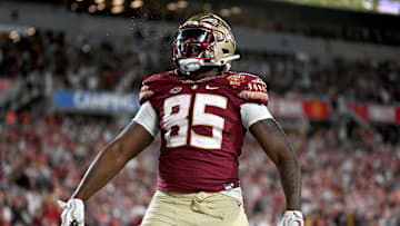Dec 29, 2022; Orlando, Florida, USA; Florida State Seminoles tight end Markeston Douglas (85) celebrates after scoring a touchdown  in the second half against the Oklahoma Sooners  in the 2022 Cheez-It Bowl at Camping World Stadium. Mandatory Credit: Jonathan Dyer-Imagn Images