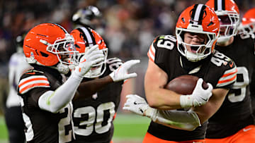 Nov 16, 2025; Cleveland, Ohio, USA; Cleveland Browns linebacker Carson Schwesinger (49) celebrates an interception with cornerback Myles Harden (26) during the third quarter against the Baltimore Ravens at Huntington Bank Field. Mandatory Credit: Ken Blaze-Imagn Images