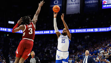 Feb 1, 2025; Lexington, Kentucky, USA; Kentucky Wildcats forward Ansley Almonor (15) shoots the ball over Arkansas Razorbacks forward Adou Thiero (3) during the second half at Rupp Arena at Central Bank Center. Mandatory Credit: Jordan Prather-Imagn Images