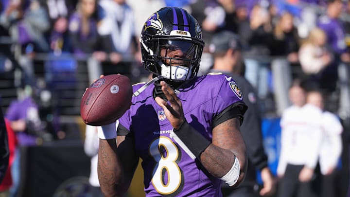 Baltimore Ravens quarterback Lamar Jackson warms up before a game.