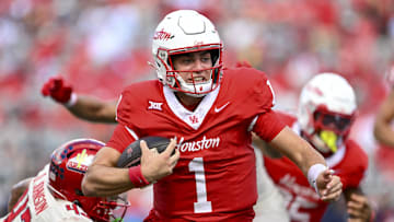 Oct 18, 2025; Houston, Texas, USA; Houston Cougars quarterback Conner Weigman (1) runs the ball into the end zone for a touchdown during the second quarter against the Arizona Wildcats at TDECU Stadium. Mandatory Credit: Maria Lysaker-Imagn Images 