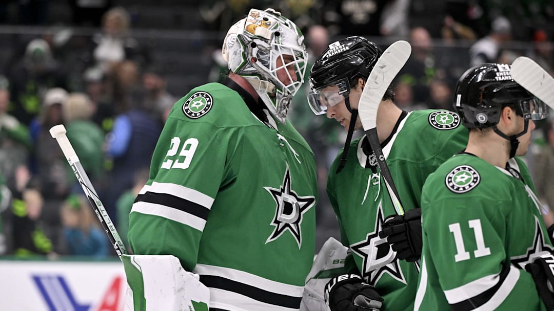 Mar 2, 2025; Dallas, Texas, USA; Dallas Stars goaltender Jake Oettinger (29) and center Wyatt Johnston (53) celebrate the win over the St. Louis Blues at the American Airlines Center. Mandatory Credit: Jerome Miron-Imagn Images