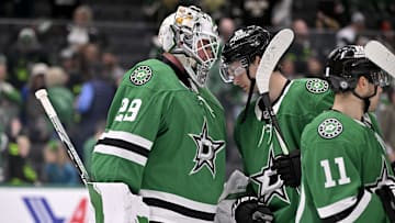 Mar 2, 2025; Dallas, Texas, USA; Dallas Stars goaltender Jake Oettinger (29) and center Wyatt Johnston (53) celebrate the win over the St. Louis Blues at the American Airlines Center. Mandatory Credit: Jerome Miron-Imagn Images