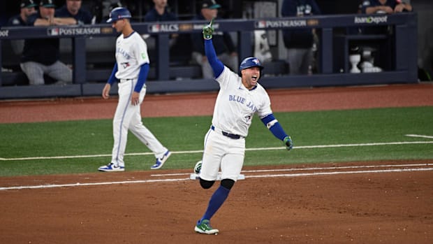 George Springer of Toronto Blue Jays runs bases after home run George Springer of Toronto Blue Jays runs bases after home run