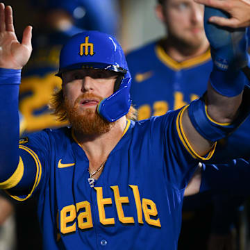 Seattle Mariners first baseman Justin Turner celebrates after scoring a run during a game against the Texas Rangers on Saturday at T-Mobile Park.