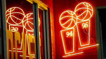 Mar 17, 2025; Houston, Texas, USA; View of neon signage in the hallway at Toyota Center commemorating the Houston Rockets championship seasons before the game against the Philadelphia 76ers. Mandatory Credit: Troy Taormina-Imagn Images
