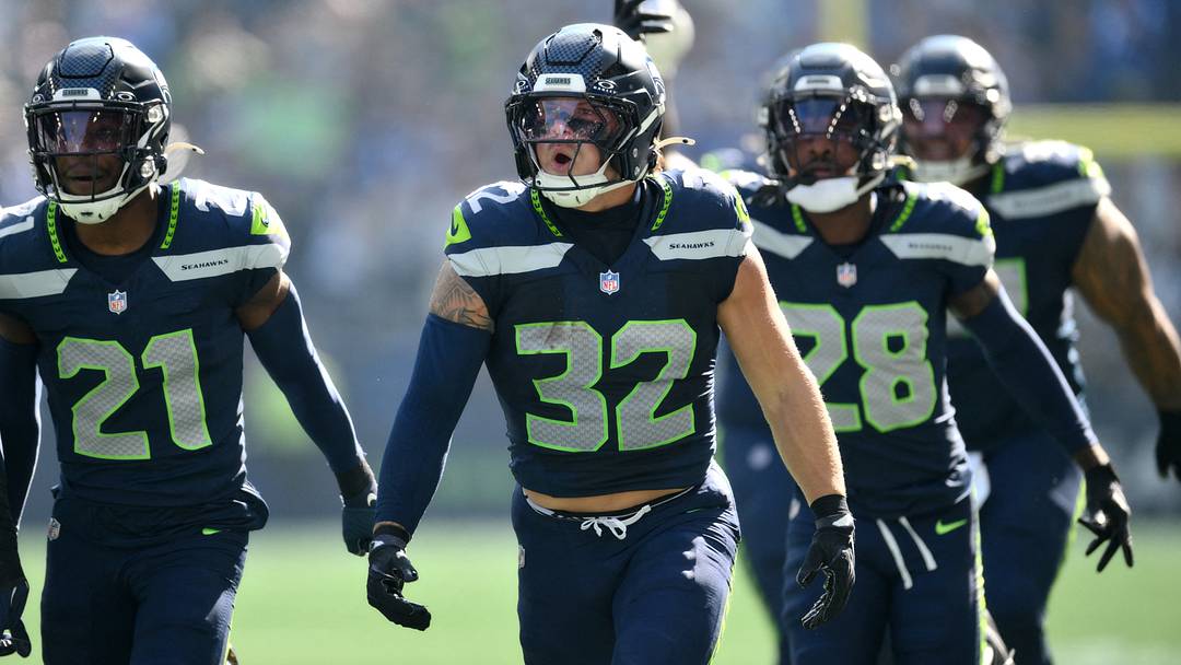Oct 4, 2026; Seattle, Washington, USA; Seattle Seahawks linebacker Drake Thomas (32) celebrates after an interception against the Los Angeles Chargers during the first half at Lumen Field. Oct 4, 2026; Seattle, Washington, USA; Seattle Seahawks linebacker Drake Thomas (32) celebrates after an interception against the Los Angeles Chargers during the first half at Lumen Field.