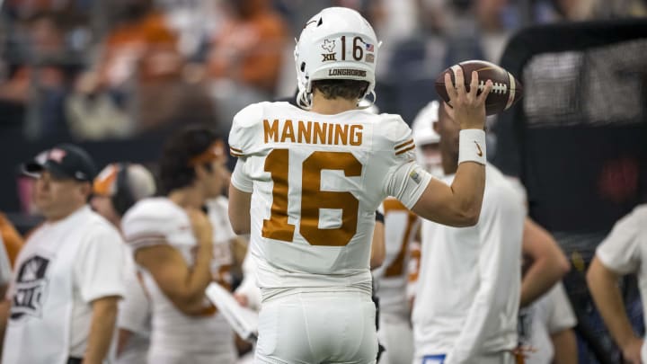 Dec 2, 2023; Arlington, TX, USA; Texas Longhorns quarterback Arch Manning (16) in action during the game between the Texas Longhorns and the Oklahoma State Cowboys at AT&T Stadium.