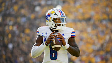 Sep 6, 2025; Columbia, Missouri, USA; Kansas Jayhawks quarterback Jalon Daniels (6) warms up during the second half against the Missouri Tigers at Faurot Field at Memorial Stadium. Mandatory Credit: Jay Biggerstaff-Imagn Images