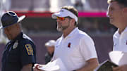 Oct 5, 2024; Stanford, California, USA;  Virginia Tech Hokies head coach Brent Pry walks back to the locker rooms after defeating the Stanford Cardinal at Stanford Stadium. Mandatory Credit: Stan Szeto-Imagn Images