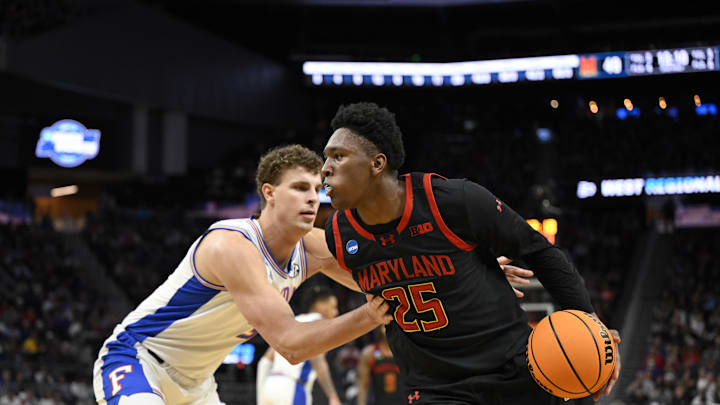 Mar 27, 2025; San Francisco, CA, USA; Maryland Terrapins center Derik Queen (25) drives to the hoop past Florida Gators center Micah Handlogten (3) during the second half during a West Regional semifinal of the 2025 NCAA tournament at Chase Center. Mandatory Credit: Eakin Howard-Imagn Images Mar 27, 2025; San Francisco, CA, USA; Maryland Terrapins center Derik Queen (25) drives to the hoop past Florida Gators center Micah Handlogten (3) during the second half during a West Regional semifinal of the 2025 NCAA tournament at Chase Center. Mandatory Credit: Eakin Howard-Imagn Images