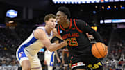 Mar 27, 2025; San Francisco, CA, USA; Maryland Terrapins center Derik Queen (25) drives to the hoop past Florida Gators center Micah Handlogten (3) during the second half during a West Regional semifinal of the 2025 NCAA tournament at Chase Center. Mandatory Credit: Eakin Howard-Imagn Images