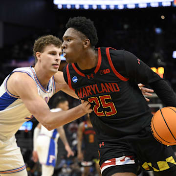 Mar 27, 2025; San Francisco, CA, USA; Maryland Terrapins center Derik Queen (25) drives to the hoop past Florida Gators center Micah Handlogten (3) during the second half during a West Regional semifinal of the 2025 NCAA tournament at Chase Center. Mandatory Credit: Eakin Howard-Imagn Images