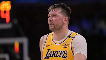 Feb 10, 2025; Los Angeles, California, USA; Los Angeles Lakers guard Luka Doncic (77) looks on from the court against the Utah Jazz at Crypto.com Arena. Mandatory Credit: Jayne Kamin-Oncea-Imagn Images