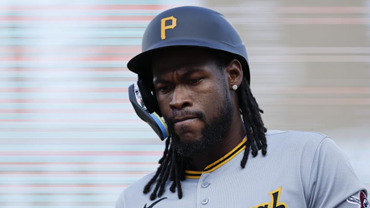 Jun 17, 2025; Detroit, Michigan, USA;  Pittsburgh Pirates outfielder Oneil Cruz (15) walks off the field in the first inning against the Detroit Tigers at Comerica Park. Mandatory Credit: Rick Osentoski-Imagn Images