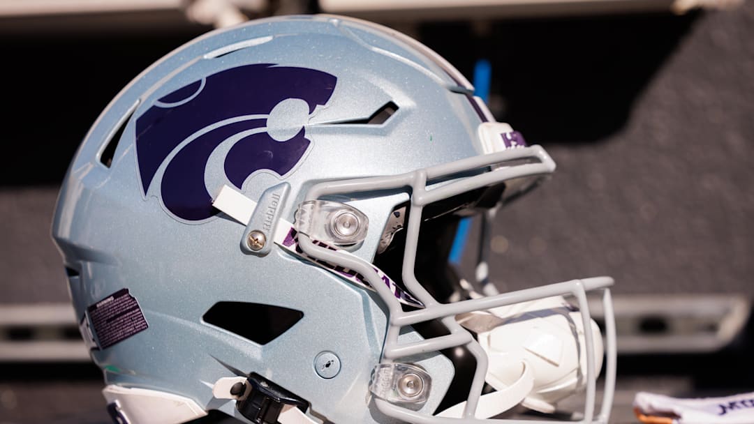Kansas State Wildcats helmet on the side lines prior to the game against the Oklahoma State Cowboys at Boone Pickens Stadium. Kansas State Wildcats helmet on the side lines prior to the game against the Oklahoma State Cowboys at Boone Pickens Stadium.