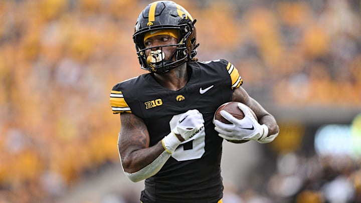 Sep 14, 2024; Iowa City, Iowa, USA; Iowa Hawkeyes running back Jaziun Patterson (9) runs for a 39 yard touchdown against the Troy Trojans during the fourth quarter at Kinnick Stadium. Mandatory Credit: Jeffrey Becker-Imagn Images