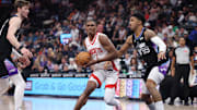 Mar 27, 2025; Salt Lake City, Utah, USA; Houston Rockets forward Amen Thompson (1) goes to the basket against Utah Jazz forward KJ Martin (99) during the second half at Delta Center. Mandatory Credit: Rob Gray-Imagn Images