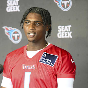 Tennessee Titans quarterback Cam Ward talks with reporters after his first day of rookie mini camp. Mandatory Credit: Steve Roberts-Imagn Images