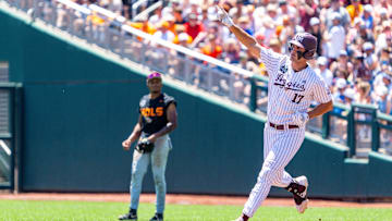 Texas A&M Aggies right fielder Jace Laviolette (17) celebrates after hitting a home run against the Tennessee Volunteers during the first inning at Charles Schwab Field Omaha.