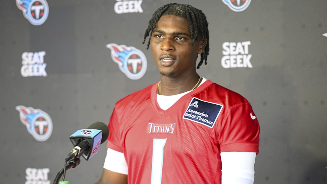 May 10, 2025; Nashville, TN, USA;  Tennessee Titans quarterback Cam Ward (1) talks with reporters after his first day of rookie mini camp  at Saint Thomas Sports Park. Mandatory Credit: Steve Roberts-Imagn Images