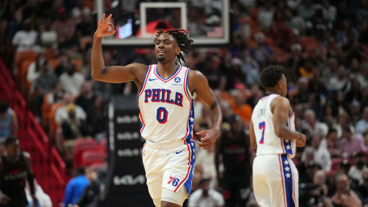 Apr 4, 2024; Miami, Florida, USA;  Philadelphia 76ers guard Tyrese Maxey (0) celebrates a three-point shot against the Miami Heat during the first half at Kaseya Center. Mandatory Credit: Jim Rassol-USA TODAY Sports