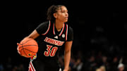 Dec 7, 2024; Brooklyn, New York, USA; Louisville Cardinals guard Jayda Curry (30) dribbles during the second half against the Connecticut Huskies at Barclays Center. Mandatory Credit: Lucas Boland-Imagn Images