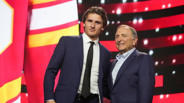 Jun 27, 2025; Los Angeles, California, USA; Cole Reschny is selected as the 18th overall pick to the Calgary Flames in the first round of the 2025 NHL Draft at Peacock Theater. Mandatory Credit: Kirby Lee-Imagn Images