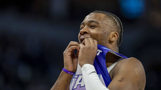 Utah Jazz guard Isaiah Collier (13) reacts to a foul called in the first half against the Minnesota Timberwolves