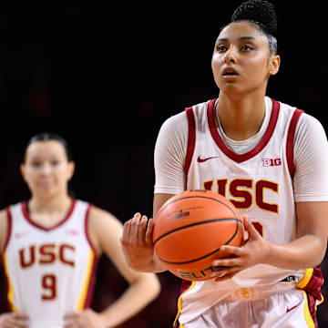 Feb 8, 2025; Los Angeles, California, USA; USC Trojans guard JuJu Watkins (12) shoots a free throw during the fourth quarter against the Ohio State Buckeyes at Galen Center. Mandatory Credit: Robert Hanashiro-Imagn Images