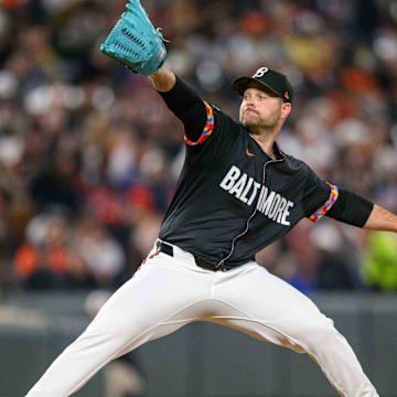 Apr 26, 2024; Baltimore, Maryland, USA; Baltimore Orioles pitcher Danny Coulombe (54) throws a pitch during the seventh inning against the Oakland Athletics at Oriole Park at Camden Yards. 