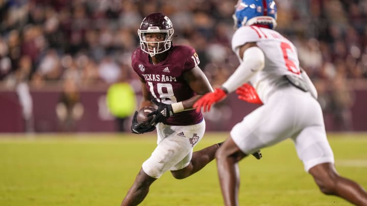Oct 29, 2022; College Station, Texas, USA;  Texas A&M Aggies tight end Donovan Green (18) runs the ball against the Mississippi Rebels in the second half at Kyle Field. Mandatory Credit: Daniel Dunn-USA TODAY Sports