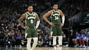 Mar 24, 2024; Milwaukee, Wisconsin, USA;  Milwaukee Bucks forward Giannis Antetokounmpo (34) and guard Damian Lillard (0) during the game against the Oklahoma City Thunder at Fiserv Forum. Mandatory Credit: Jeff Hanisch-Imagn Images