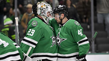 Jan 2, 2025; Dallas, Texas, USA; Dallas Stars defenseman Ilya Lyubushkin (46) hugs goaltender Jake Oettinger (29) after the Stars defeat the Ottawa Senators at the American Airlines Center. Mandatory Credit: Jerome Miron-Imagn Images