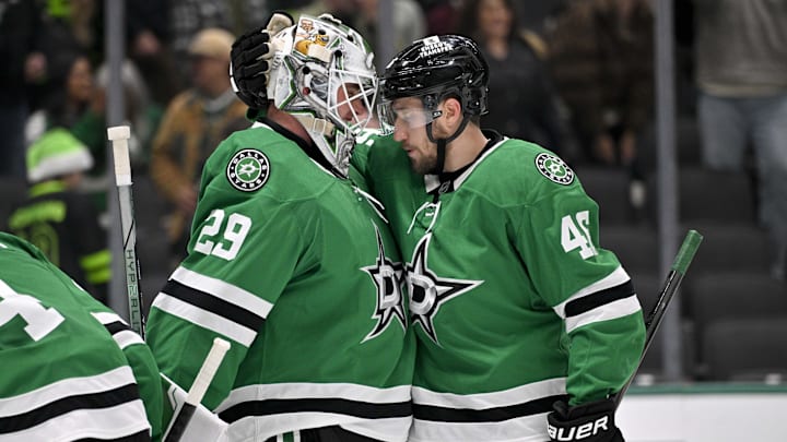 Jan 2, 2025; Dallas, Texas, USA; Dallas Stars defenseman Ilya Lyubushkin (46) hugs goaltender Jake Oettinger (29) after the Stars defeat the Ottawa Senators at the American Airlines Center. Mandatory Credit: Jerome Miron-Imagn Images