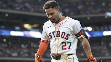 Jun 28, 2025; Houston, Texas, USA; Houston Astros second baseman Jose Altuve (27) walks off the field after flying out during the sixth inning against the Chicago Cubs at Daikin Park.